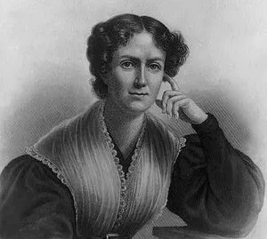 Black and white illustration of a white woman with curled hair and a lacey dress with darker sleeves. She has a neutral expression with her left hand touching her face.